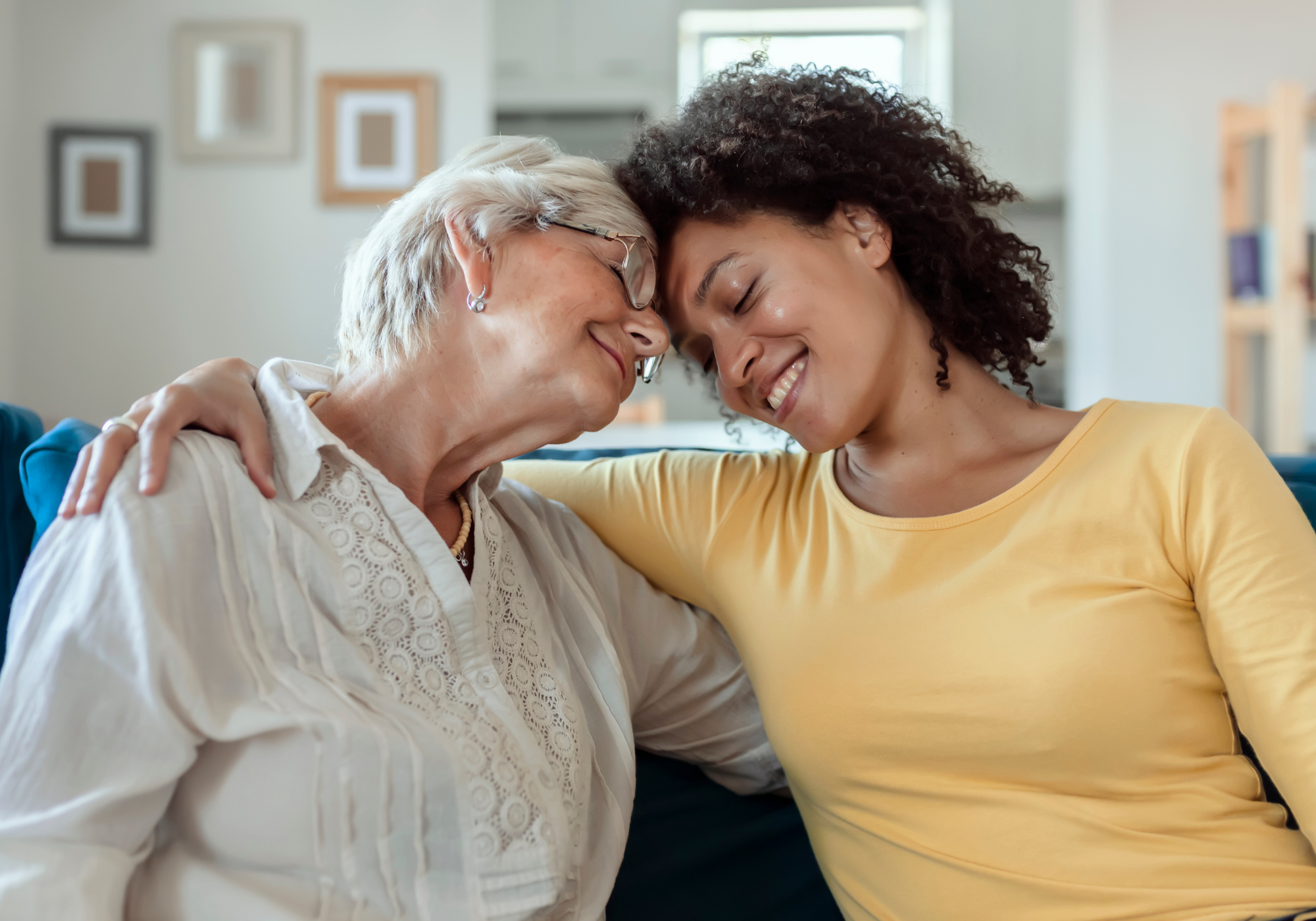 woman hugging elderly mother